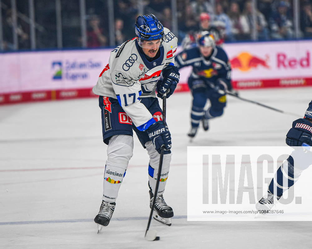 Munich, Germany PENNY DEL, German Ice Hockey League, 2026–27 season, Matchday 7: EHC Red Bull Munich vs. ERC Ingolstadt at SAP Garden in Munich. Taro Hirose of EHC Red Bull Munich passing, making a pass, and handing off the puck
