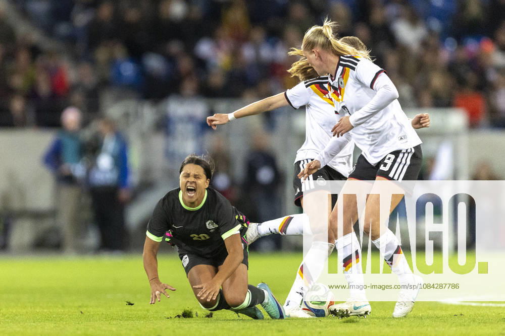 GER, Karlsruhe, football, womens football, International Friendly, Länderspiel, Nationalmannschaft Germany vs. Australia in the picture f.l.: Sam Kerr (Australia 20), goes down to the grass after a tackle against Camilla Kuever (Germany 03), 09.10.2026, BBBank Wildpark Karlsruhe DFB REGULATIONS PROHIBIT ANY USE OF PHOTOGRAPHS AS IMAGE SEQUENCES AND OR QUASI-VIDEO, Karlsruhe BBBank Wildpark Baden-Wuerttemberg Germany