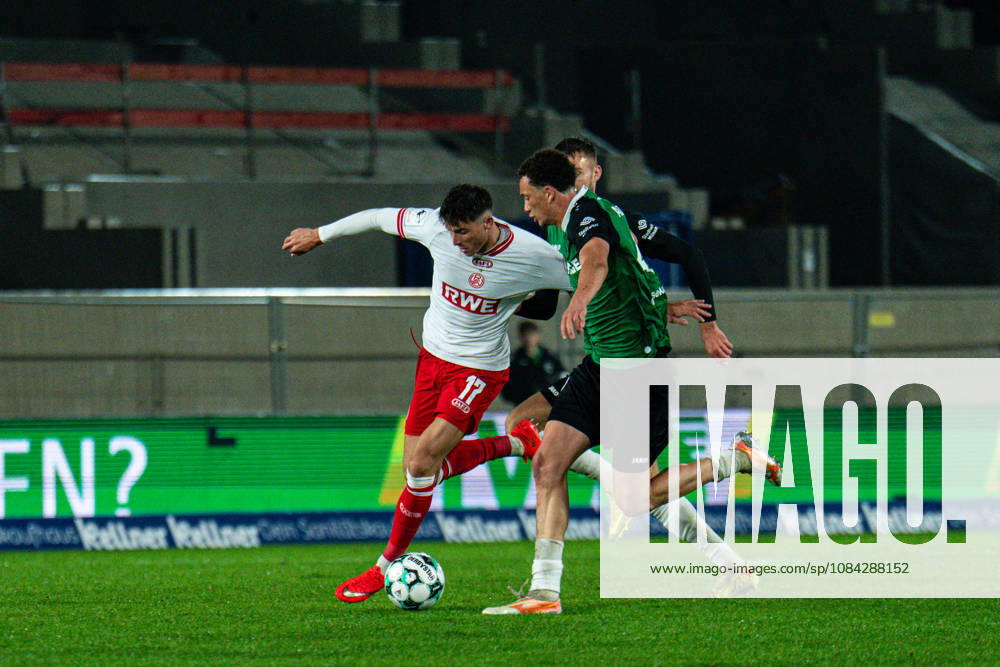 3rd Division, Matchday 8, SC Preußen Münster vs. Rot Weiss Essen at the LVM Preußenstadion; Semir Telalovic (Essen) is held back. IMPORTANT NOTICE: In accordance with DFB and DFL regulations, it is prohibited to use or allow the use of photographs taken in the stadium and or during the game in the form of sequential images and or video-like photo series