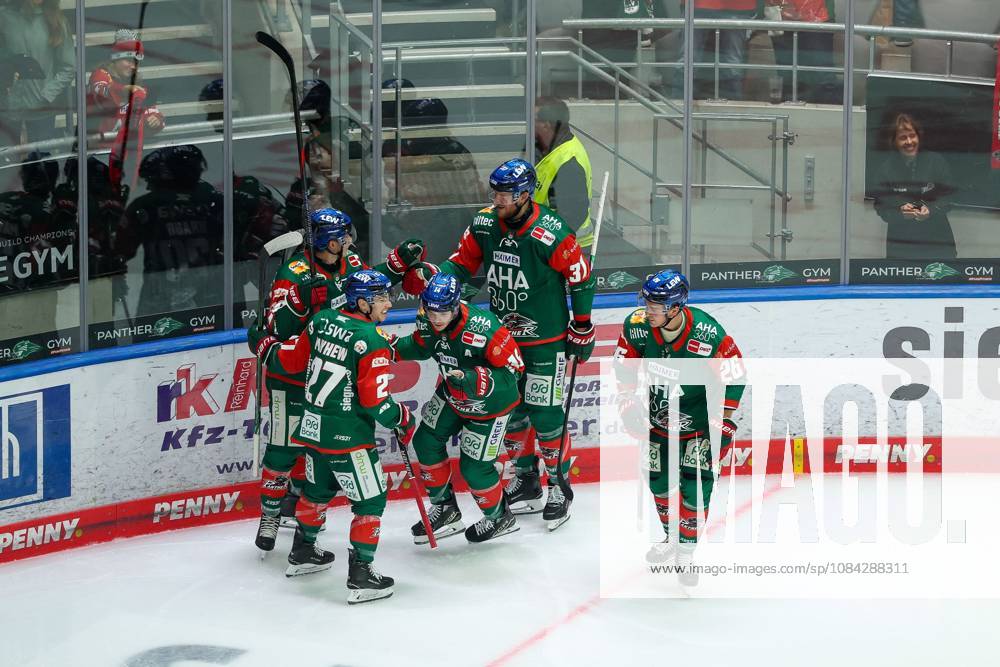 The team is celebrating D. J. Busdeker s goal—14 for the Augsburg Panthers, making the score 1–0—in the game between the Augsburg Panthers and the Fischtown Pinguins, Matchday 7, ice hockey, Penny DEL, October 9, 2026, Augsburg, Bavaria, Germany