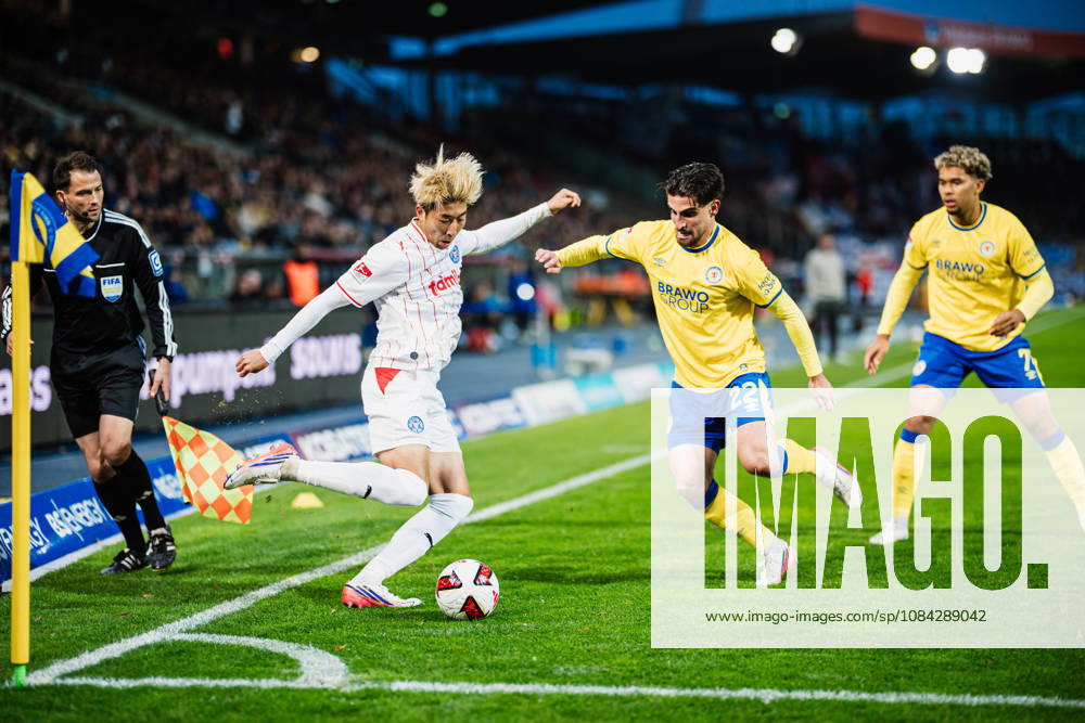 2. Bundesliga: Eintracht Braunschweig vs. Holstein Kiel, October 9, 2026—Hiroki Sekine (Holstein Kiel, 32) vs. Fabio Di Michele Sanchez (Eintracht Braunschweig, 22)—tackle, soccer, 2. Bundesliga, Matchday 7: Eintracht Braunschweig vs. Holstein Kiel on October 9, 2026, at Eintracht Stadium, Braunschweig. DFL regulations prohibit any use of photographs as image sequences and or quasi-video.