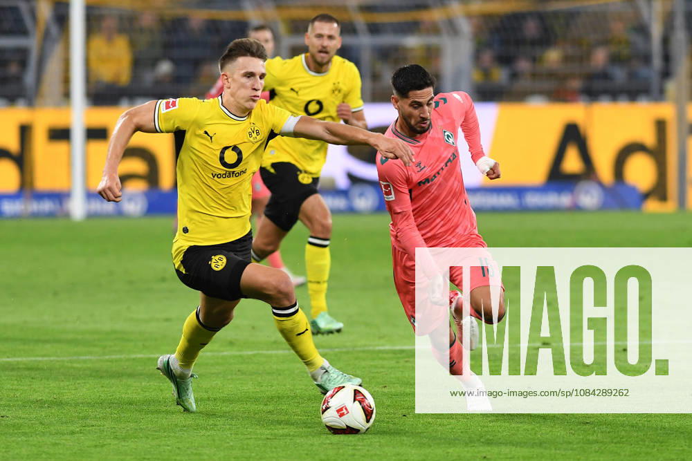 Nico Schlotterbeck of Borussia Dortmund and Ludovic Reis of Werder Bremen battle for the ball during the Bundesliga match between Borussia Dortmund and SV Werder Bremen at Signal Iduna Park on October 9, 2026, in Dortmund, Germany Photo by Ralf Treese, DeFodi Images Nico Schlotterbeck of Borussia Dortmund and Ludovic Reis of Werder Bremen battle for the ball during the Bundesliga match between Borussia Dortmund and SV Werder Bremen at Signal Iduna Park on October 9, 2026 in Dortmund, Germany. Photo by Ralf Treese, DeFodi Images. DFB and DFL regulations prohibit any use of photographs as image sequences and or quasi-video. Photo by Ralf Treese, DeFodi Images.