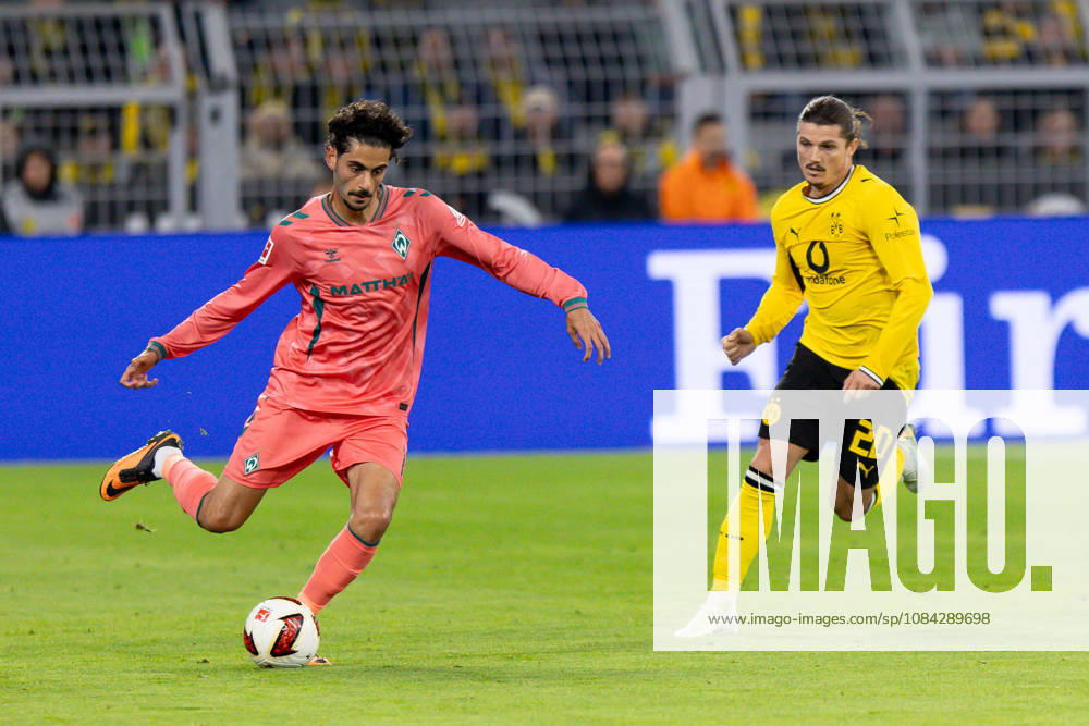 Dortmund, Germany October 9, 2026 Bundesliga 2026–2027 Matchday 5: Borussia Dortmund vs. SV Werder Bremen Pictured from left in a tackle: Eren Dinkci (SVW) and Marcel Sabitzer (BVB). DFL and DFB regulations prohibit any use of photographs as image sequences and or quasi-video Signal Iduna Park, North Rhine-Westphalia
