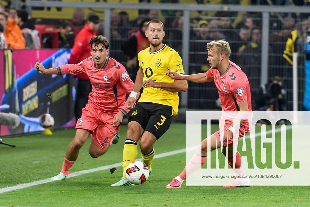 From left: Olivier Deman (Bremen 2), Waldemar Anton (Dortmund 3), and Marco Grüll (Bremen 17) battling for the ball on September 10, 2026 ¢ Soccer ¢ Borussia Dortmund vs. SV Werder Bremen, Signal Iduna Park, Dortmund, DFB DFL regulations prohibit any use of photographs as image sequences and or quasi-video NRW Germany