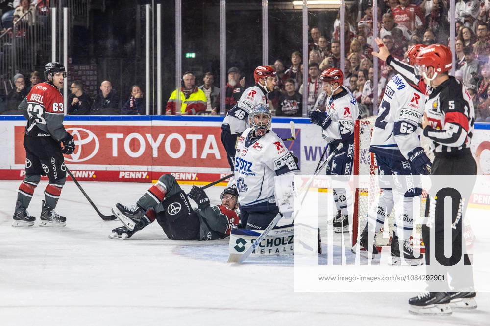 Former Berlin player Marcel Noebel of the Cologne Sharks, 92, is lying on the ice, and Joacim Eriksson of the Schwenningen Wild Wings, 60, looks questioningly at the referee; Patrick Russell of the Cologne Sharks, 63, and Eric Martinsson of the Schwenningen Wild Wings, 46, and Thomas Schemitsch of the Schwenninger Wild Wings, 62. Cologne Haie vs. Schwenninger Wild Wings, ice hockey, Penny DEL, Matchday 07, 2026–2027, October 9, 2026, Cologne Haie vs. Schwenninger Wild Wings, Ice Hockey, Penny DEL, Matchday 07, 2026–2027, October 9, 2026, Cologne