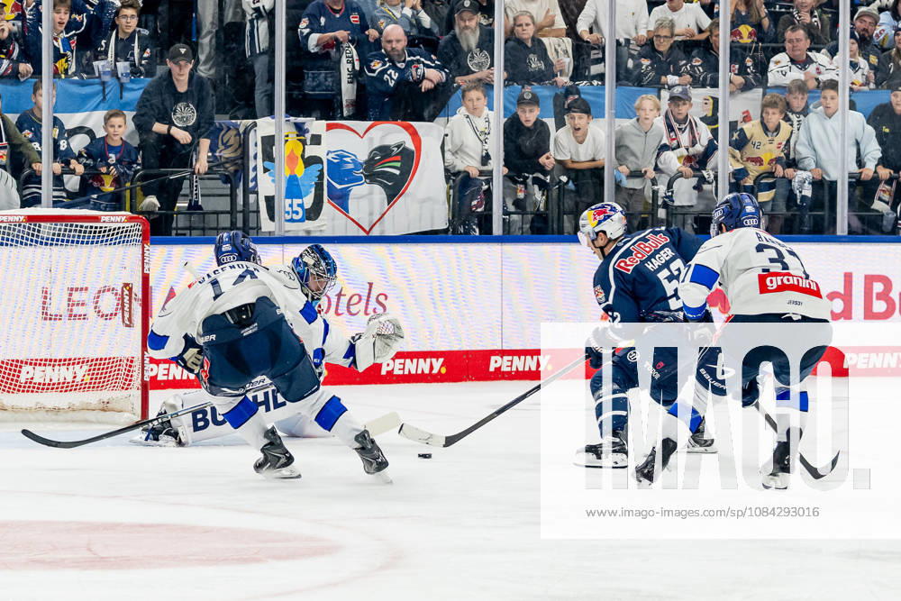 Emil Kvernmo Wasenden, ERC Ingolstadt, 14; Jonas Stettmer, goaltender, ERC Ingolstadt, 01; and Riley Barber, ERC Ingolstadt, 37, defend against Patrick Hager, EHC Red Bull Munich, 52 (GER), EHC Red Bull Munich vs. ERC Ingolstadt, DEL, 2026–2027 season, Matchday 7, October 9, 2026. Photo: HMB Media, Franz Feiner