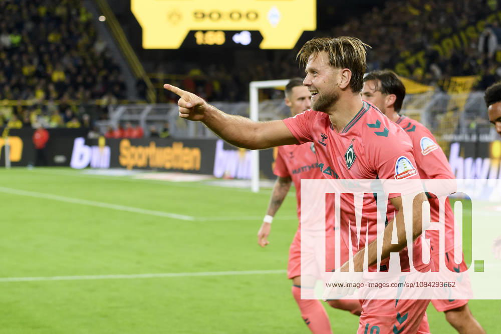 Niclas Fuellkrug of SV Werder Bremen celebrates his goal, which tied the score at 2–2, during the Bundesliga match between Borussia Dortmund and SV Werder Bremen at Signal Iduna Park on October 9, 2026, in Dortmund, Germany. Photo by Max Maiwald, DeFodi Images. Niclas Fuellkrug of SV Werder Bremen celebrates after scoring his team’s second goal during the Bundesliga match between Borussia Dortmund and SV Werder Bremen at Signal Iduna Park on October 9, 2026 in Dortmund, Germany. Photo by Max Maiwald, DeFodi Images. DFB and DFL regulations prohibit any use of photographs as image sequences and or quasi-video. Photo by Max Maiwald, DeFodi Images.