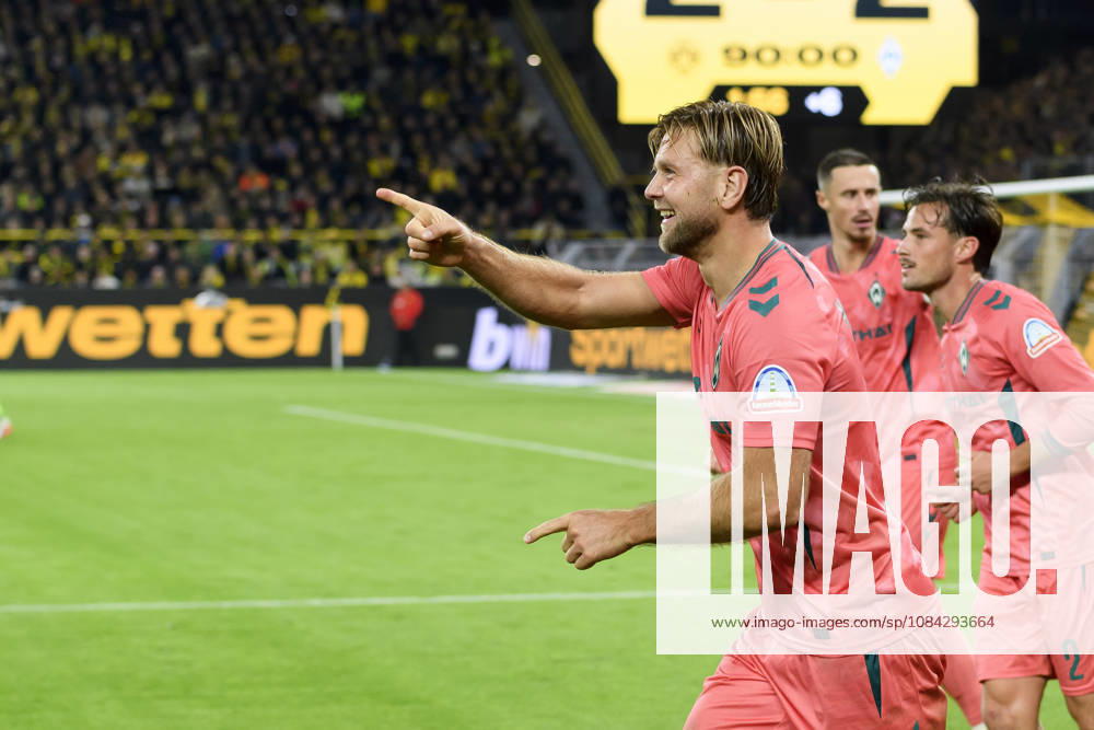 Niclas Fuellkrug of SV Werder Bremen celebrates his goal, which tied the score at 2–2, during the Bundesliga match between Borussia Dortmund and SV Werder Bremen at Signal Iduna Park on October 9, 2026, in Dortmund, Germany. Photo by Max Maiwald, DeFodi Images. Niclas Fuellkrug of SV Werder Bremen celebrates after scoring his team’s second goal during the Bundesliga match between Borussia Dortmund and SV Werder Bremen at Signal Iduna Park on October 9, 2026 in Dortmund, Germany. Photo by Max Maiwald, DeFodi Images. DFB and DFL regulations prohibit any use of photographs as image sequences and or quasi-video. Photo by Max Maiwald, DeFodi Images.