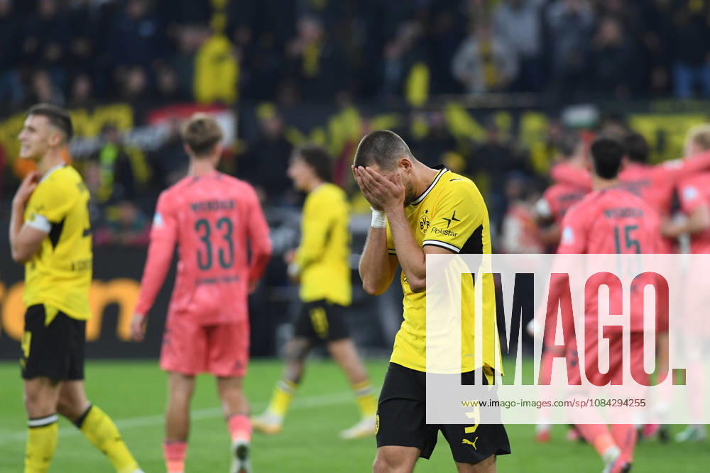 Nico Schlotterbeck of Borussia Dortmund and Waldemar Anton of Borussia Dortmund look dejected after the game during the Bundesliga match between Borussia Dortmund and SV Werder Bremen at Signal Iduna Park on October 9, 2026, in Dortmund, Germany. Photo by Ralf Treese, DeFodi Images. Nico Schlotterbeck of Borussia Dortmund and Waldemar Anton of Borussia Dortmund look dejected after the game during the Bundesliga match between Borussia Dortmund and SV Werder Bremen at Signal Iduna Park on October 9, 2026 in Dortmund, Germany Photo by Ralf Treese DeFodi Images DFB and DFL regulations prohibit any use of photographs as image sequences and or quasi-video Photo by Ralf Treese DeFodi Images