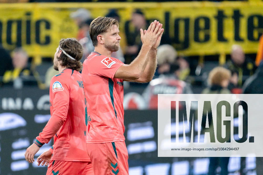 Germany, Bundesliga 1, 2026–2027, Matchday 5: Borussia Dortmund vs. Werder Bremen, October 9, 2026, Signal Iduna Park, North Rhine-Westphalia. Niclas Füllkrug, No. 10, apologizes to the Dortmund fans in the South Stand for his goal after the final whistle.