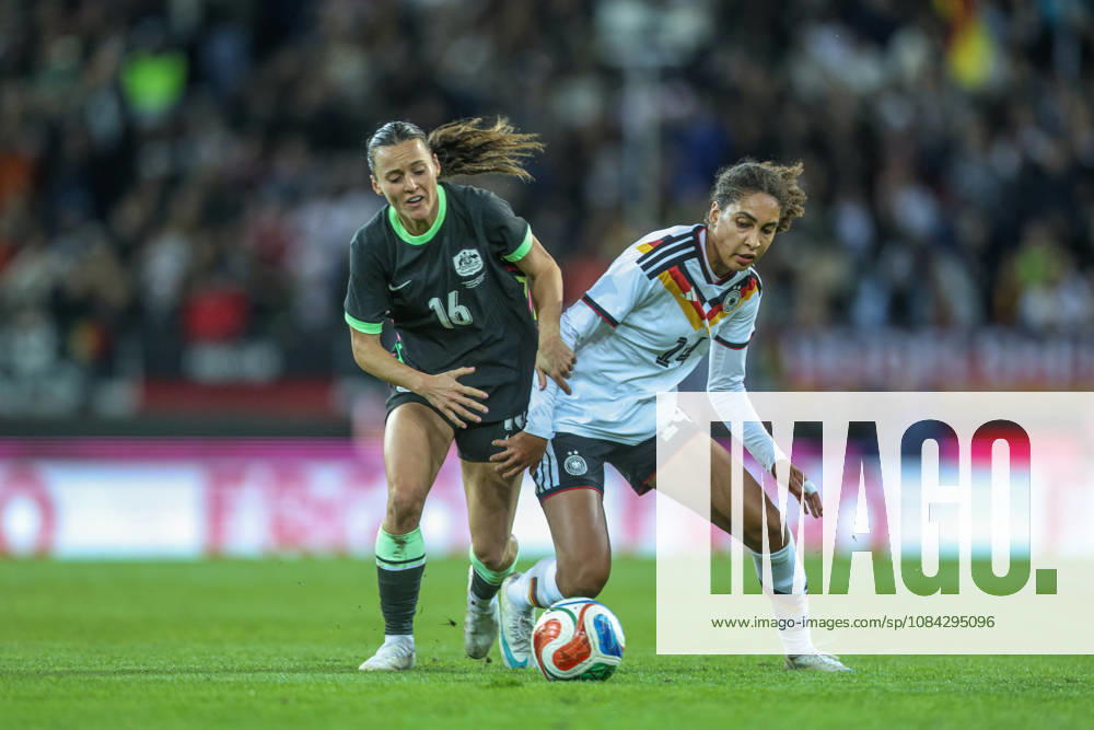 GER, Karlsruhe, Germany vs. Australia, FIFA, DFB, Soccer, 2026–2027 Season, BBBank Wildpark, Friendly Match: Pictured from left: Hayley Raso (Australia), No. 16, Cora Zicai, Germany, Women’s National Team, tackle. DFB and DFL regulations prohibit any use of photographs as image sequences and or quasi-video