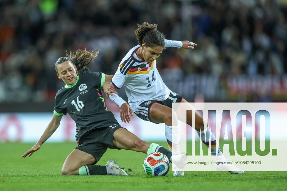 GER, Karlsruhe, Germany vs. Australia, FIFA, DFB, Soccer, 2026–2027 Season, BBBank Wildpark, Friendly Match: Pictured from left: Hayley Raso (Australia), No. 16, Cora Zicai, Germany, Women’s National Team, tackle. DFB and DFL regulations prohibit any use of photographs as image sequences and or quasi-video