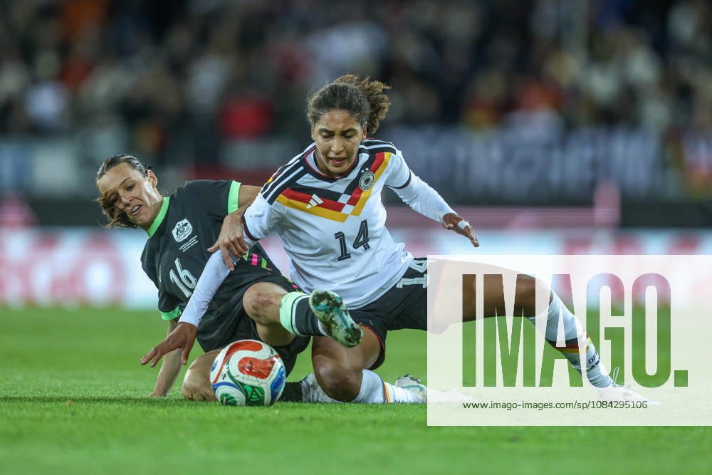 GER, Karlsruhe, Germany vs. Australia, FIFA, DFB, Soccer, 2026–2027 Season, BBBank Wildpark, Friendly Match: Pictured from left: Hayley Raso (Australia), No. 16, Cora Zicai, Germany, Women’s National Team, tackle. DFB and DFL regulations prohibit any use of photographs as image sequences and or quasi-video