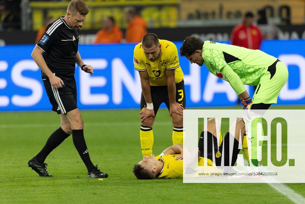 Dortmund, Germany, October 9, 2026, Nico Schlotterbeck of Borussia Dortmund suffers a shoulder injury during the Bundesliga match between Borussia Dortmund and SV Werder Bremen at Signal Iduna Park in Dortmund. Photo by Joachim Bywaletz. DFB and DFL regulations prohibit any use of photographs as image sequences and or quasi- VIDEO