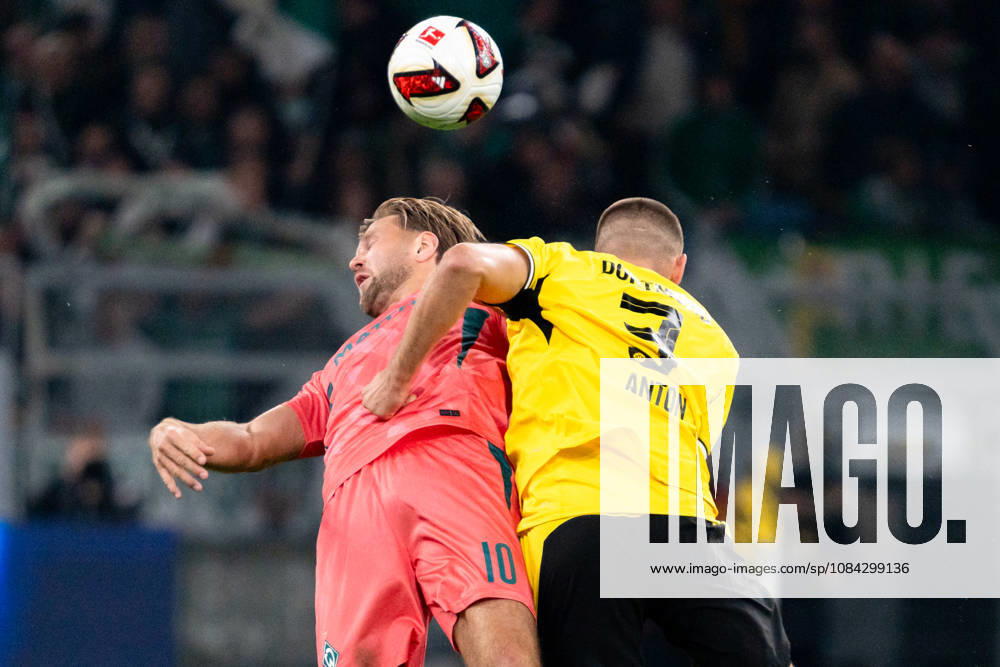 Germany 1 Bundesliga 2026–2027, Matchday 5: Borussia Dortmund vs. Werder Bremen, October 9, 2026, Signal Iduna Park, North Rhine-Westphalia; Niclas Füllkrug 10, Waldemar Anton, Borussia Dortmund; 3, Tackle, Duel