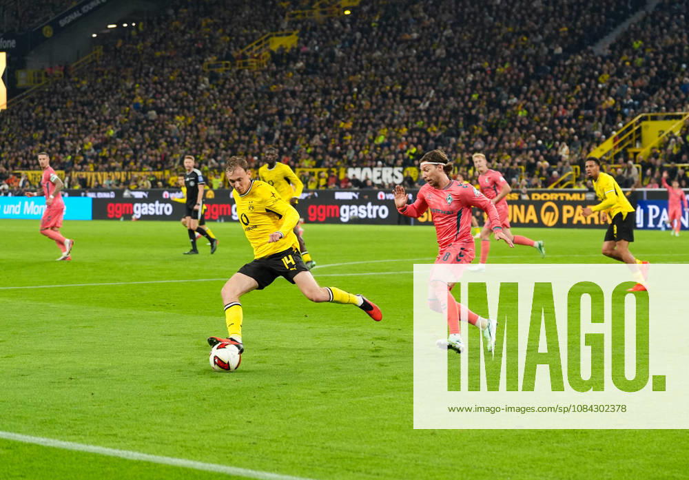 Maximilian Beier, Borussia Dortmund, 14, and Mitchell Weiser, SV Werder Bremen, 8, GER; Borussia Dortmund vs. SV Werder Bremen, Bundesliga 1, Matchday 5, 2026–27 season, SIGNAL IDUNA PARK, Dortmund, October 9, 2026 DFL regulations prohibit any use of photographs as image sequences and or quasi-video Borussia Dortmund vs. SV Werder Bremen, Bundesliga 1, Matchday 5, 2026–27 season, October 9, 2026, Dortmund