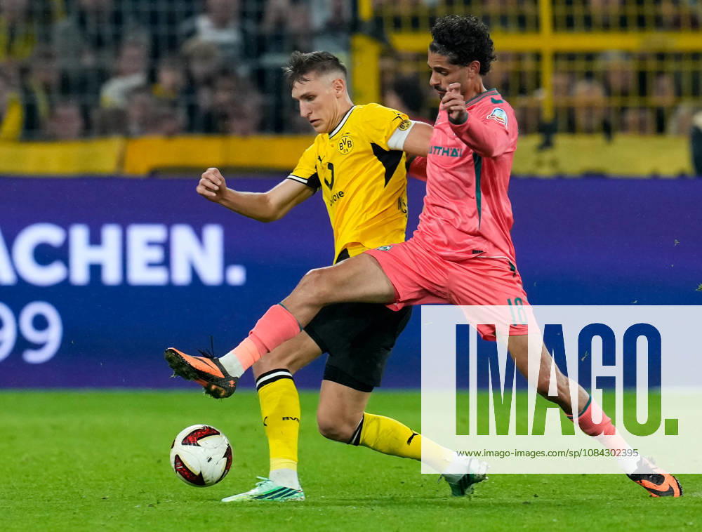 Nico Schlotterbeck (Borussia Dortmund, 4) in a tackle with Eren Dinkci (SV Werder Bremen, 18) GER, Borussia Dortmund vs. SV Werder Bremen, Bundesliga 1, Matchday 5, 2026–27 season, SIGNAL IDUNA PARK, Dortmund, October 9, 2026 DFL regulations prohibit any use of photographs as image sequences and or quasi-video Borussia Dortmund vs. SV Werder Bremen, Bundesliga 1, Matchday 5, 2026–27 season, October 9, 2026, Dortmund