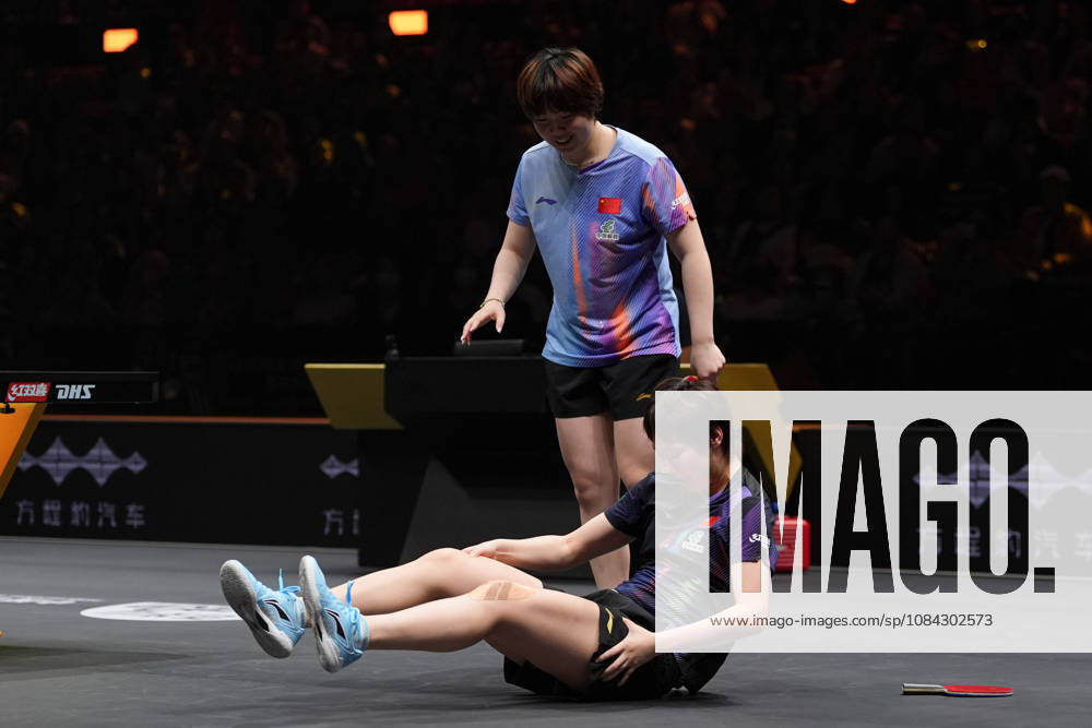 (261010) -- BEIJING, Oct. 10, 2026 -- Wang Manyu(bottom) of China falls down during the women s doubles final match between Wang Manyu Kuai Man of China and Harimoto Miwa Hayata Hina of Japan at 2026 World Table tennis, Tischtennis (WTT) China Smash in Beijing, China, Oct. 10, 2026. ) (SP)CHINA-BEIJING-TABLE TENNIS-WTT-CHINA SMASH-WOMEN S DOUBLES (CN) XiexHan