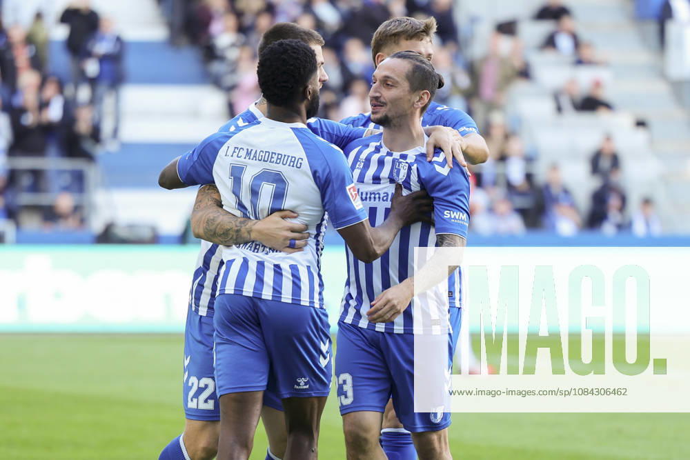 Moritz Broni Kwarteng of 1 FC Magdeburg celebrates his goal with his teammates during the 2. Bundesliga match between 1 FC Magdeburg and Hannover 96 at Avnet Arena on October 10, 2026, in Magdeburg, Germany. Photo by Marco Steinbrenner, DeFodi Images. Moritz Broni Kwarteng of 1 FC Magdeburg celebrates his goal with teammates during the 2nd Bundesliga match between 1 FC Magdeburg and Hannover 96 at Avnet Arena on October 10, 2026 in Magdeburg, Germany. Photo by Marco Steinbrenner, DeFodi Images. DFB and DFL regulations prohibit any use of photographs as image sequences and or quasi-video. Photo by Marco Steinbrenner, DeFodi Images.