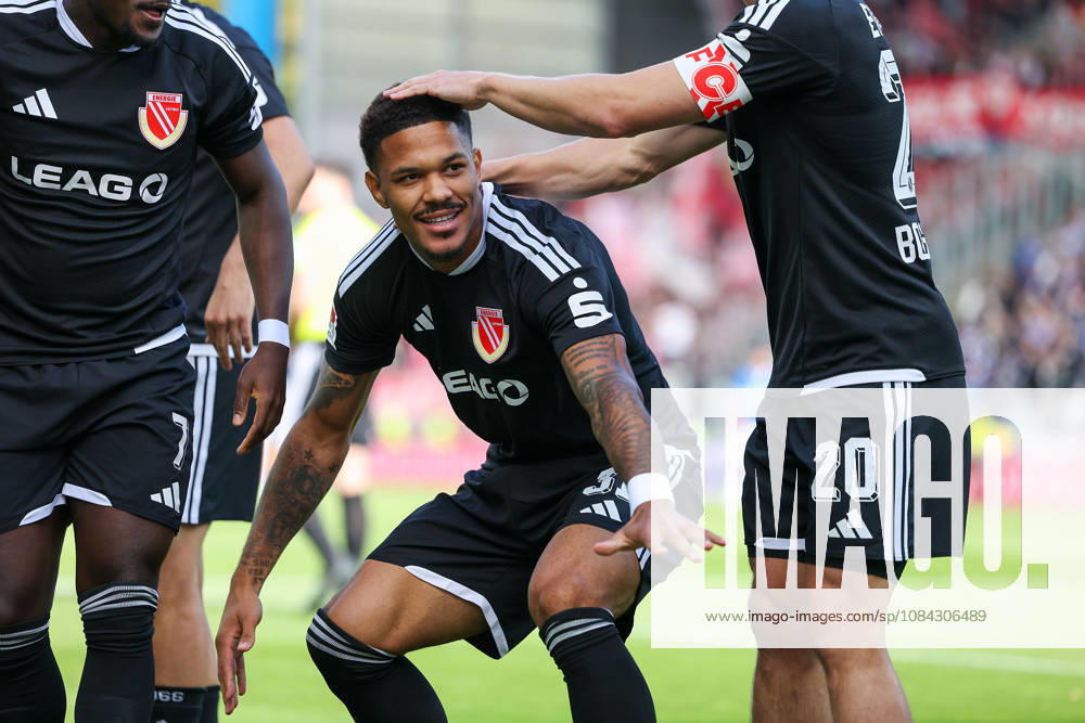 Soccer 2. Bundesliga SV Darmstadt 98 vs. Energie Cottbus, Justin Butler of Energie Cottbus and his teammates are seen celebrating after scoring a goal to make the score 0–1
