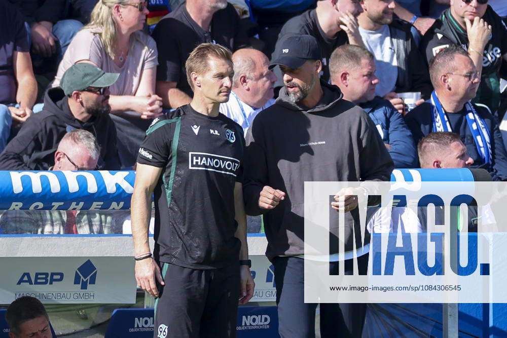 Goalkeeper coach Michael Ratajczak of Hannover 96 and head coach Sandro Wagner of Hannover 96 chat during the 2. Bundesliga match between 1. FC Magdeburg and Hannover 96 at Avnet Arena on October 10, 2026, in Magdeburg, Germany. Photo by Marco Steinbrenner, DeFodi Images. Goalkeeper coach Michael Ratajczak of Hannover 96 and head coach Sandro Wagner of Hannover 96 talk together during the 2. Bundesliga match between 1. FC Magdeburg and Hannover 96 at Avnet Arena on October 10, 2026 in Magdeburg, Germany. Photo by Marco Steinbrenner, DeFodi Images. DFB and DFL regulations prohibit any use of photographs as image sequences and or quasi-video. Photo by Marco Steinbrenner, DeFodi Images.