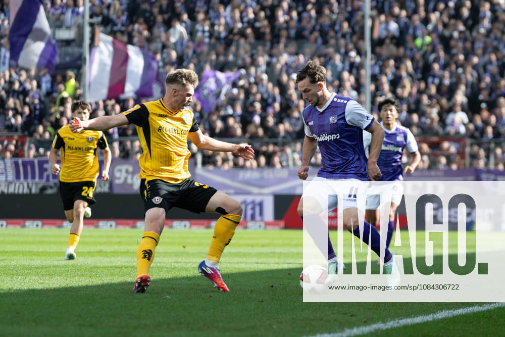 Robin Meißner 11 (Osnabrück) in a tackle with Jonas Sterner 32 (Dresden), VfL Osnabrück vs. SG Dynamo Dresden, Soccer, 2. Bundesliga, Matchday 7, October 10, 2026. DFL regulations prohibit any use of photographs as image sequences and or quasi-video. Osnabrück, Lower Saxony, Germany