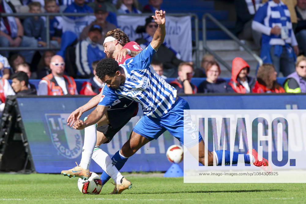 Emmanuel Iyoha of 1 FC Magdeburg and Kolja Oudenne of Hannover 96 battle for the ball during the 2. Bundesliga match between 1 FC Magdeburg and Hannover 96 at Avnet Arena on October 10, 2026, in Magdeburg, Germany. Photo by Marco Steinbrenner, DeFodi Images. Emmanuel Iyoha of 1 FC Magdeburg and Kolja Oudenne of Hannover 96 battle for the ball during the 2. Bundesliga match between 1 FC Magdeburg and Hannover 96 at Avnet Arena on October 10, 2026 in Magdeburg, Germany. Photo by Marco Steinbrenner, DeFodi Images. DFB and DFL regulations prohibit any use of photographs as image sequences and or quasi-video. Photo by Marco Steinbrenner, DeFodi Images.