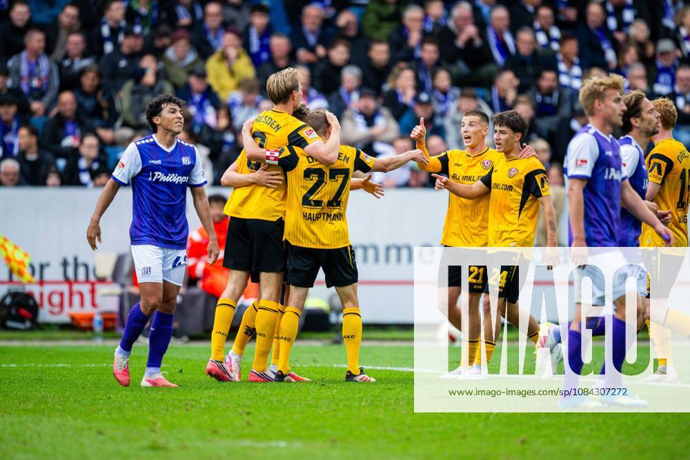 Soccer, 2026–2027, 2. Bundesliga, Matchday 7, VfL Osnabrück vs. SG Dynamo Dresden: Players celebrating after Niklas Hauptmann’s goal to make it 0–1. Dresden: L Jonathan Gomez (Osnabrück), M R Vincent Vermeij (Dresden), Tobias Raschl (Dresden), Patrice Covic (Dresden). DFL regulations prohibit any use of photographs as image sequences and or quasi-video.