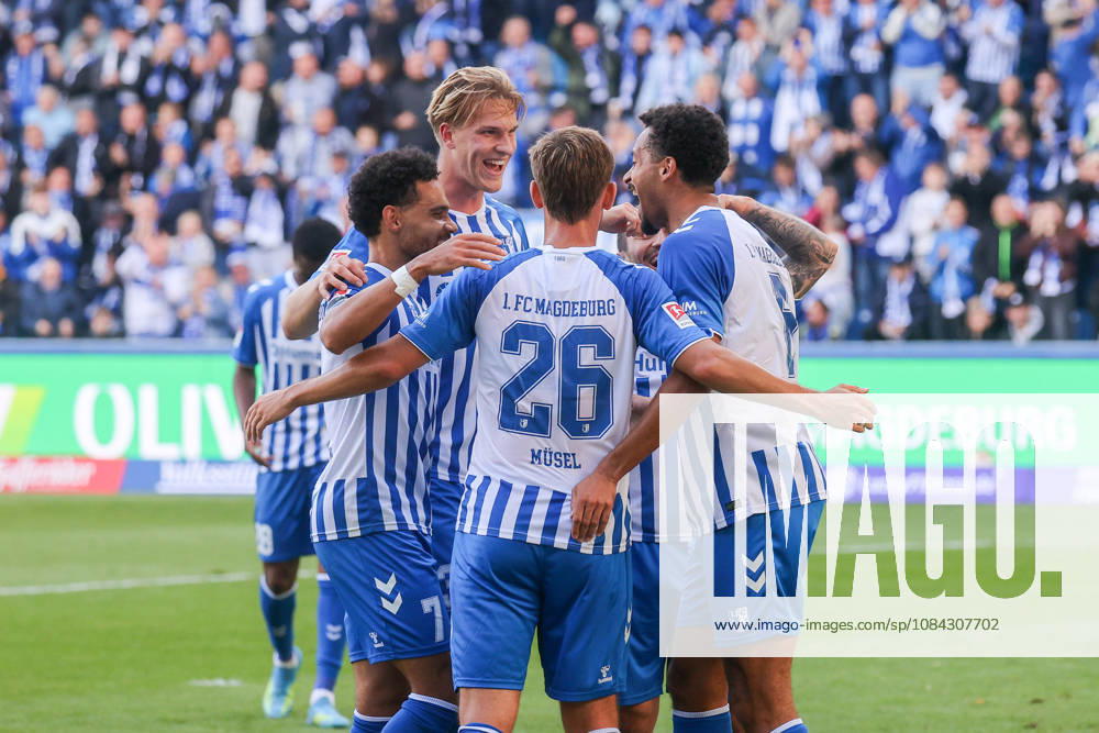 Soccer, 2. Bundesliga, 1. FC Magdeburg vs. Hannover 96,, from left: Celebrations after Emmanuel Iyoha s 2-0 goal for Magdeburg, 8 DFL and DFB regulations prohibit any use of photographs as image sequences and or quasi-video. Magdeburg