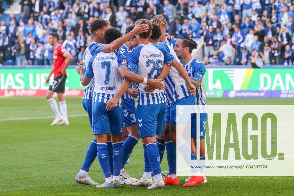 Soccer, 2. Bundesliga, 1. FC Magdeburg vs. Hannover 96,, from left: Celebrations after Emmanuel Iyoha’s 2-0 goal for Magdeburg, 8 DFL and DFB regulations prohibit any use of photographs as image sequences and or quasi-video. Magdeburg
