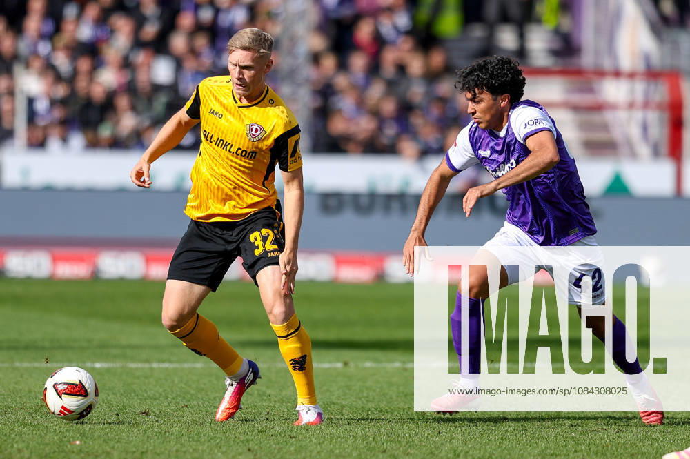 Soccer, 2. Bundesliga, VfL Osnabrück vs. SG Dynamo Dresden, Stadion an der Bremer Brücke, Matchday 7, 2026–2027 season: Friedrich Mueller (SG Dynamo Dresden, No. 42) in a tackle against Jonathan German Gomez (VfL Osnabrück, No. 42). DFB regulations prohibit any use of photographs as image sequences and or quasi-video. Photo: WilkowskixPressefotoKochx, Lower Saxony, Germany