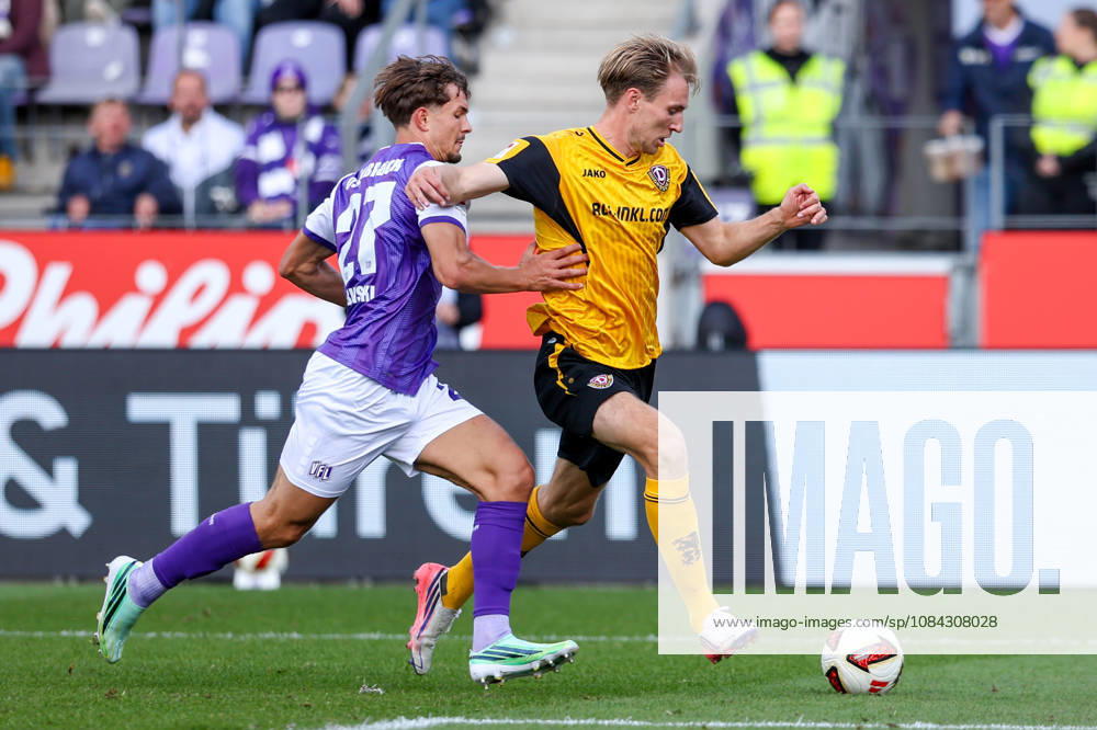 Soccer, 2. Bundesliga, VfL Osnabrück vs. SG Dynamo Dresden, Stadion an der Bremer Brücke, Matchday 7, 2026–2027 season: Vincent Vermeij of SG Dynamo Dresden (9) in a tackle against Robin Fabinski of VfL Osnabrück (27). DFB regulations prohibit any use of photographs as image sequences and or quasi-video. Photo: WilkowskixPressefotoKochx, Lower Saxony, Germany