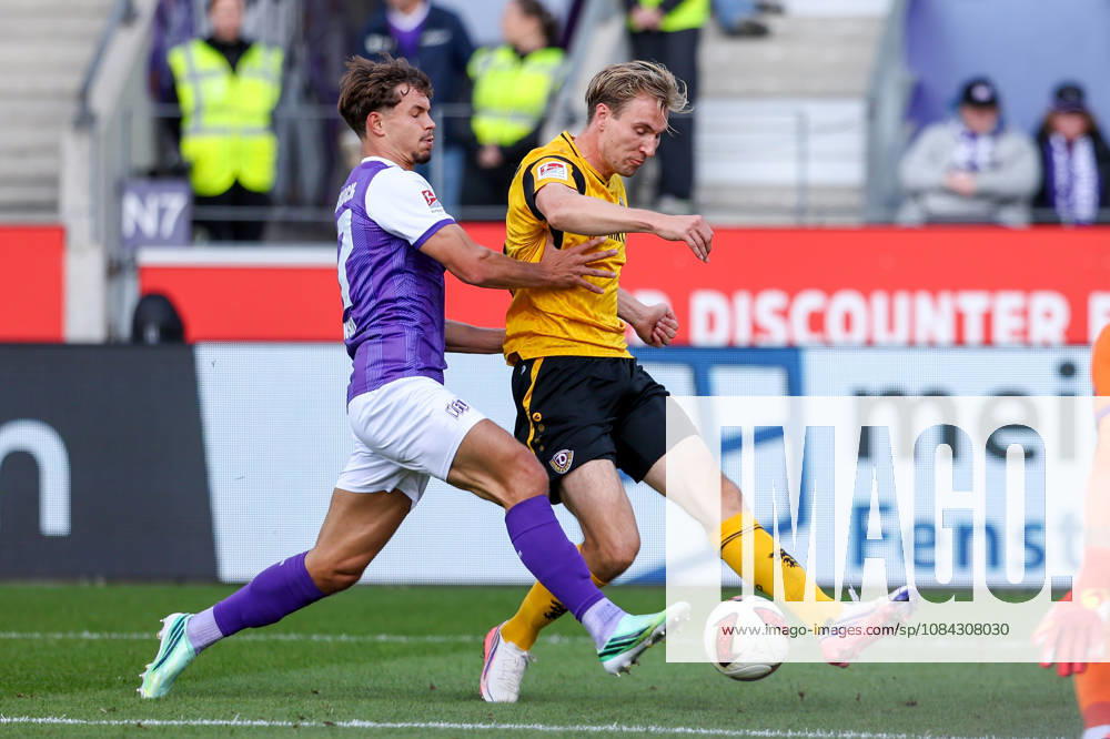 Soccer, 2. Bundesliga, VfL Osnabrück vs. SG Dynamo Dresden, Stadion an der Bremer Brücke, Matchday 7, 2026–2027 season: Vincent Vermeij of SG Dynamo Dresden (9) in a tackle against Robin Fabinski of VfL Osnabrück (27). DFB regulations prohibit any use of photographs as image sequences and or quasi-video. Photo: WilkowskixPressefotoKochx, Lower Saxony, Germany