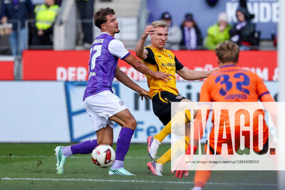 Soccer, 2. Bundesliga, VfL Osnabrück vs. SG Dynamo Dresden, Stadion an der Bremer Brücke, Matchday 7, 2026–2027 Season: Vincent Vermeij (SG Dynamo Dresden, No. 9) in a tackle against Robin Fabinski (VfL Osnabrück, No. 27) and Jonas Krumrey (VfL Osnabrück, No. 32). DFB regulations prohibit any use of photographs as image sequences and or quasi-video. Photo: WilkowskixPressefotoKochx Lower Saxony, Germany