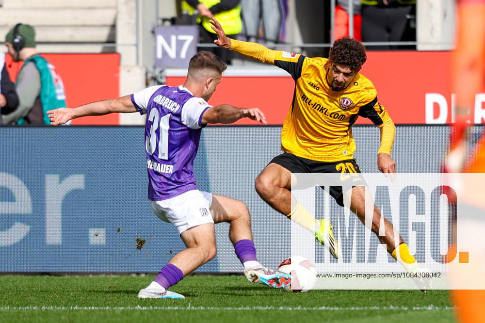 soccer, 2. Bundesliga, VfL Osnabrück vs. SG Dynamo Dresden, Stadion an der Bremer Brücke, Matchday 7, 2026–2027 season: Patrick Kammerbauer (VfL Osnabrück, No. 31) in a tackle against Ben Bobzien (SG Dynamo Dresden, No. 20). DFB regulations prohibit any use of photographs as image sequences and or quasi-video. Photo: WilkowskixPressefotoKochx, Lower Saxony, Germany