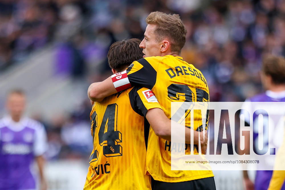 Soccer, 2. Bundesliga, VfL Osnabrück vs. SG Dynamo Dresden, Stadion an der Bremer Brücke, Matchday 7, 2026–2027 Season: Niklas Hauptmann (SG Dynamo Dresden, No. 27) celebrates with Patrice Covic (SG Dynamo Dresden, No. 24) after scoring the 0–1 goal. DFB regulations prohibit any use of photographs as image sequences and or quasi-video. Photo: WilkowskixPressefotoKochx LowerLower Saxony, Germany