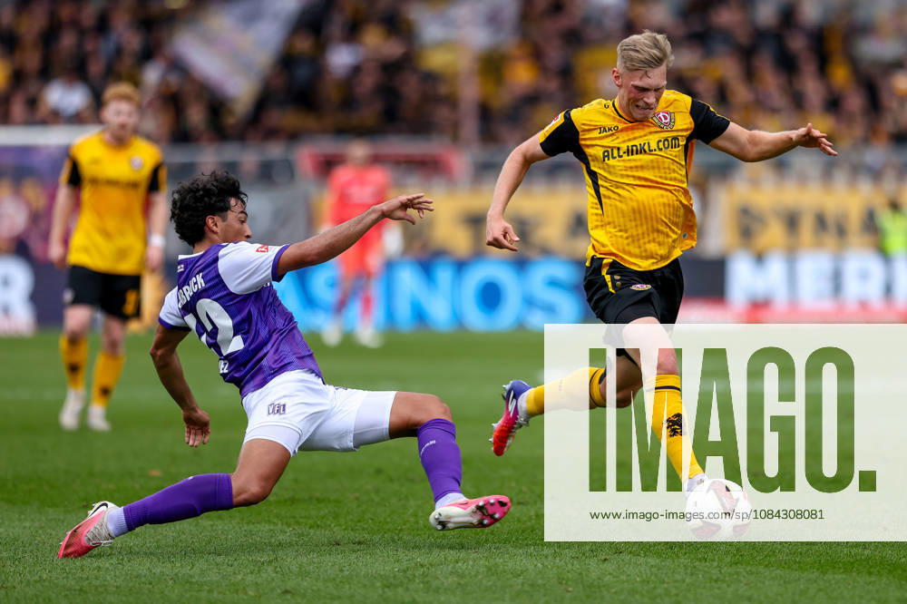 Soccer, 2. Bundesliga, VfL Osnabrück vs. SG Dynamo Dresden, Stadion an der Bremer Brücke, Matchday 7, 2026–2027 season: Jonas Sterner (SG Dynamo Dresden, No. 32) wins a tackle against Jonathan German Gomez (VfL Osnabrück, No. 42). DFB regulations prohibit any use of photographs as image sequences and or quasi-video. Photo: WilkowskixPressefotoKochx, Lower Saxony Germany