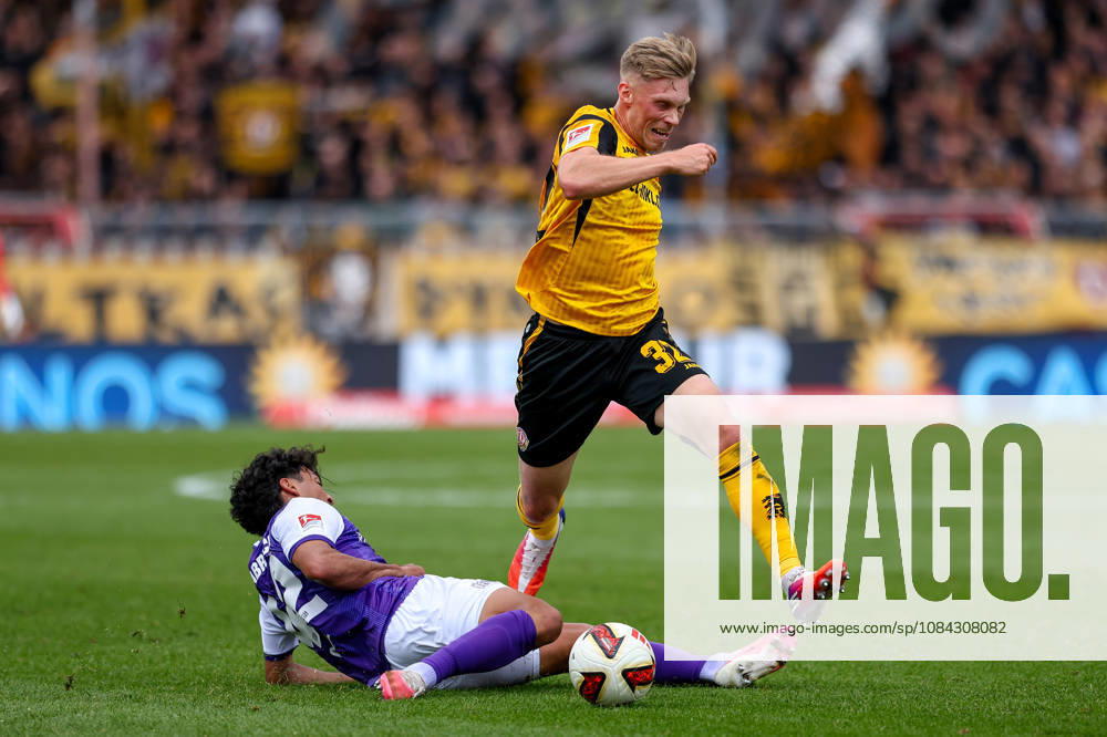 Soccer, 2. Bundesliga, VfL Osnabrück vs. SG Dynamo Dresden, Stadion an der Bremer Brücke, Matchday 7, 2026–2027 season: Jonas Sterner (SG Dynamo Dresden, No. 32) wins a tackle against Jonathan German Gomez (VfL Osnabrück, No. 42). DFB regulations prohibit any use of photographs as image sequences and or quasi-video. Photo: WilkowskixPressefotoKochx, Lower Saxony Germany
