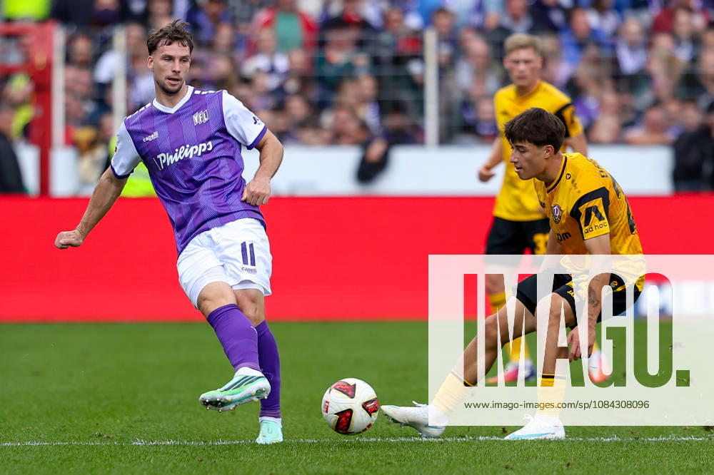 Soccer, 2. Bundesliga, VfL Osnabrück vs. SG Dynamo Dresden, Stadion an der Bremer Brücke, Matchday 7, 2026–2027 Season: Robin Meissner (VfL Osnabrück, No. 11) in a tackle against Patrice Covic (SG Dynamo Dresden, No. 24). DFB regulations prohibit any use of photographs as image sequences and or quasi-video. Photo: WilkowskixPressefotoKochx, Lower Saxony Germany