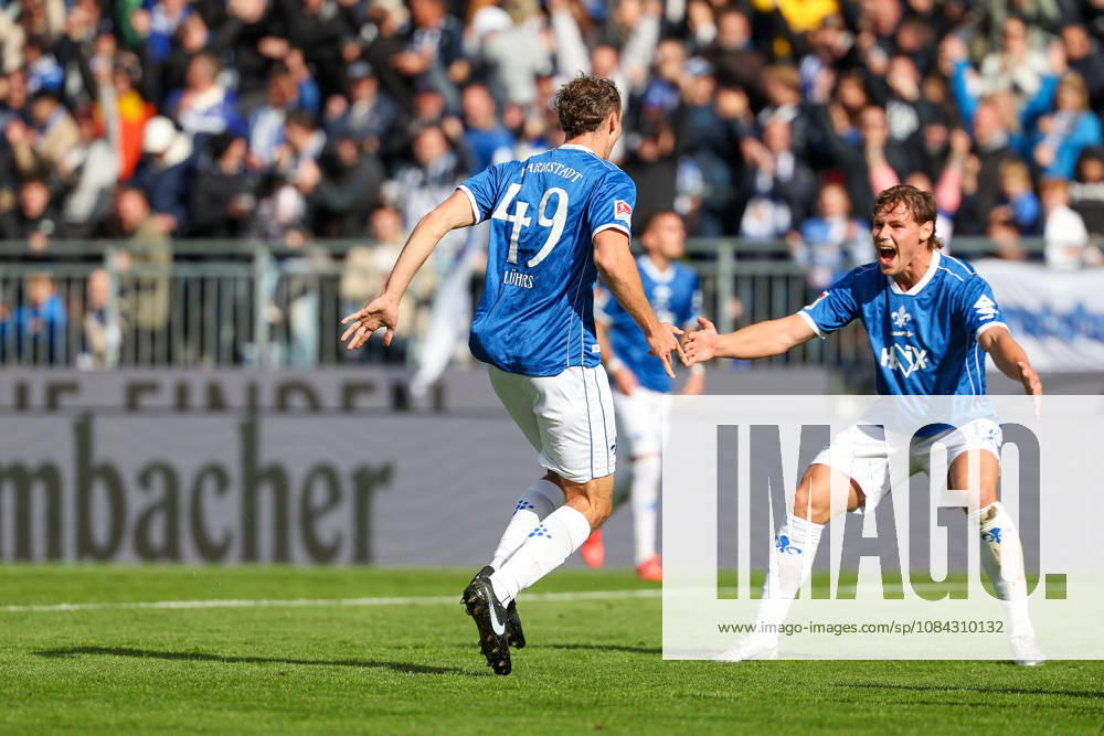 Soccer, 2. Bundesliga, SV Darmstadt 98 vs. Energie Cottbus; Yannik Luehrs of SV Darmstadt 98 and Fynn Luca Lakenmacher of SV Darmstadt 98 are seen celebrating after scoring a goal to make the score 3–1.