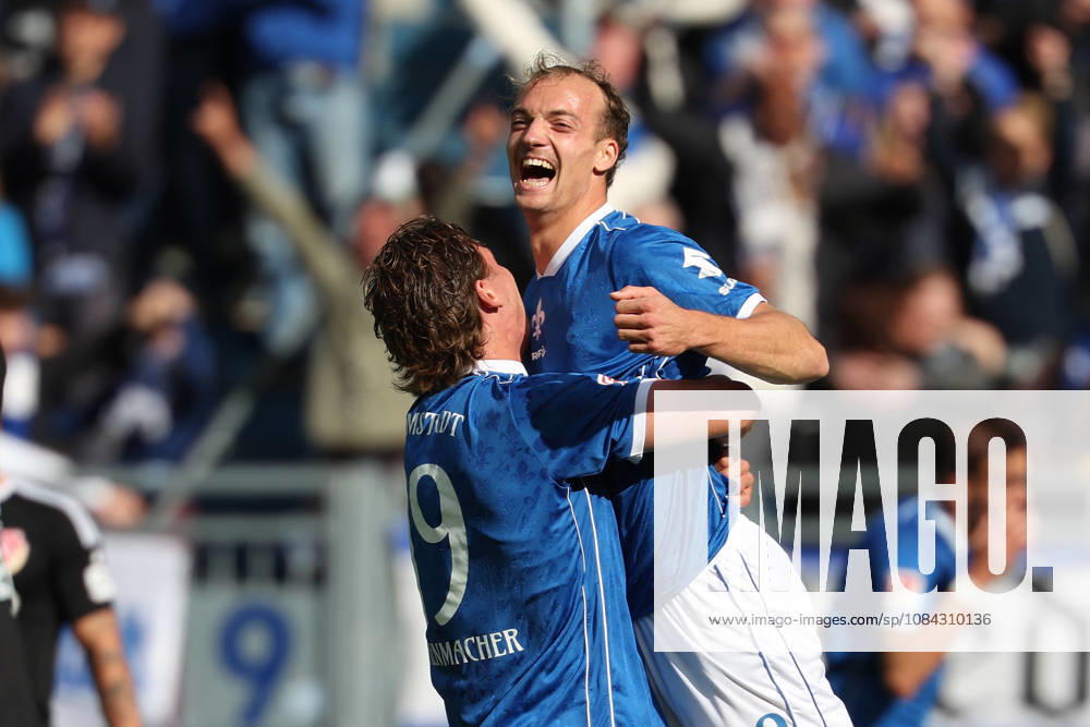 Soccer, 2. Bundesliga, SV Darmstadt 98 vs. Energie Cottbus; Fynn Luca Lakenmacher of SV Darmstadt 98 and Yannik Luehrs of SV Darmstadt 98 are seen celebrating after scoring a goal to make the score 3–1.