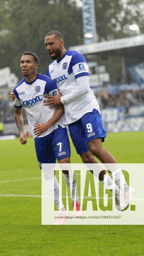 Hänsch Arena, Meppen, GER, 3. Liga, Matchday 9: SV Meppen vs. VfB Stuttgart II, Oliver Schmitt (SV Meppen 7) celebrates with Cyrill Akono (SV Meppen 9) after the 1–1 tie. DFL REGULATIONS PROHIBIT ANY USE OF PHOTOGRAPHS AS IMAGE SEQUENCES AND OR QUASI-VIDEO. Meppen, Lower Saxony, Hänsch Arena