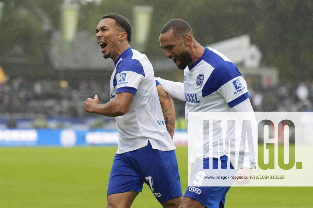 Hänsch Arena, Meppen, GER, 3. Liga, Matchday 9: SV Meppen vs. VfB Stuttgart II, Oliver Schmitt (SV Meppen 7) celebrates with Cyrill Akono (SV Meppen 9) after the 1–1 tie. DFL REGULATIONS PROHIBIT ANY USE OF PHOTOGRAPHS AS IMAGE SEQUENCES AND OR QUASI-VIDEO. Meppen, Lower Saxony, Hänsch Arena