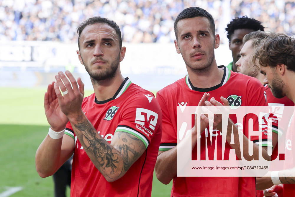 Waniss Taibi of Hannover 96 and Bastian Allgeier of Hannover 96 look disappointed during the 2. Bundesliga match between 1. FC Magdeburg and Hannover 96 at the Avnet Arena on October 10, 2026, in Magdeburg, Germany. Photo by Marco Steinbrenner, DeFodi Images. Waniss Taibi of Hannover 96 and Bastian Allgeier of Hannover 96 look dejected during the 2nd Bundesliga match between 1 FC Magdeburg and Hannover 96 at Avnet Arena on October 10, 2026 in Magdeburg, Germany. Photo by Marco Steinbrenner, DeFodi Images. DFB and DFL regulations prohibit any use of photographs as image sequences and or quasi-video. Photo by Marco Steinbrenner, DeFodi Images.