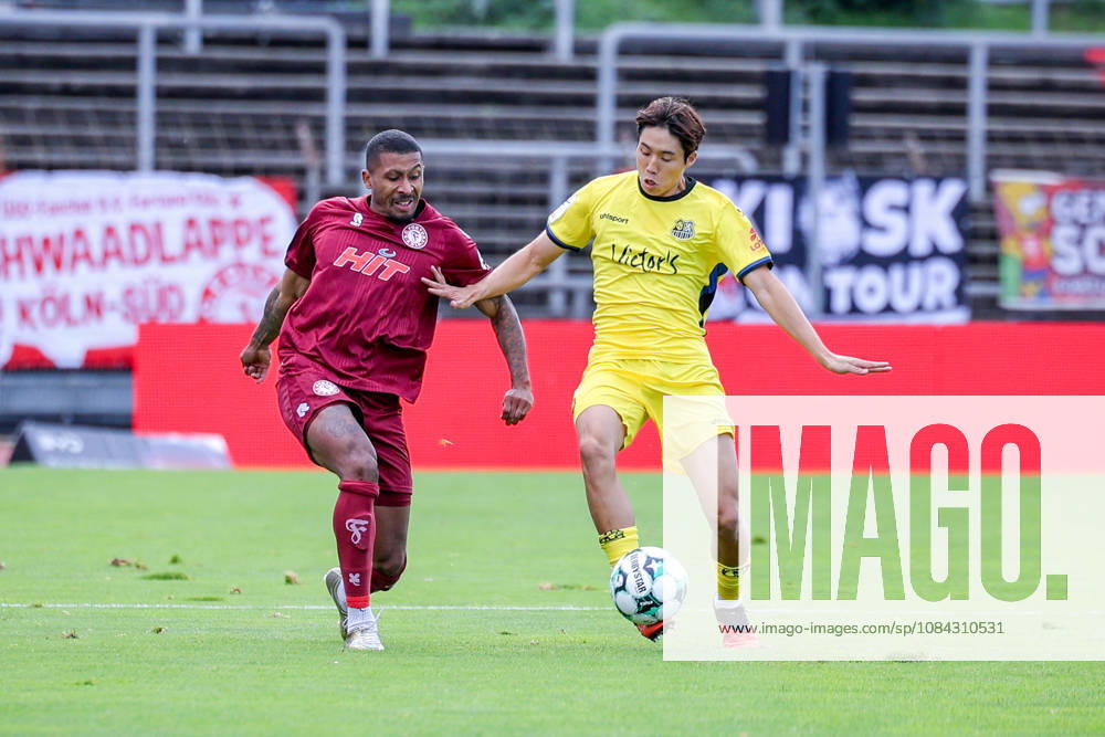 Soccer, SC Fortuna Köln vs. 1 FC Saarbrücken, 3. Liga, Südstation, Matchday 8, 2026–2027 Season Seung Joon Lee of 1 FC Saarbrücken (16) in a tackle against Florian Heister of Fortuna Cologne (17) DFB regulations prohibit any use of photographs as image sequences and or quasi-video North Rhine-Westphalia, Germany