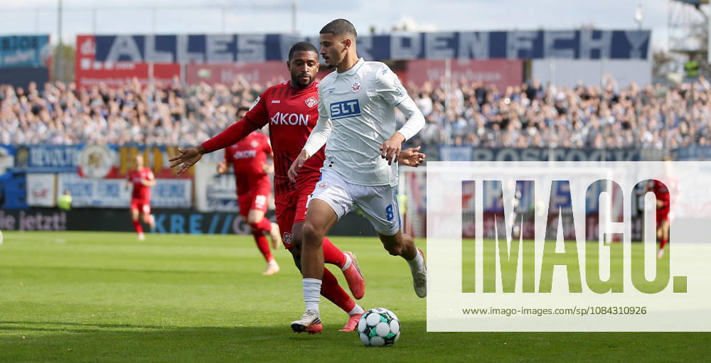 Men s, Soccer, 2026–2027 Season, 3rd Division, Matchday 8: FC Würzburger Kickers vs. FC Hansa Rostock; from left: Franck Evina (FC Würzburger Kickers), Ouassim Karada (FC Hansa Rostock); Würzburg, AKON ARENA, Bavaria, Germany