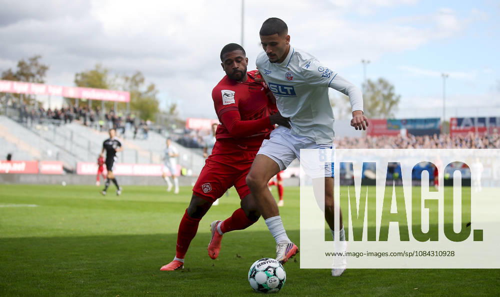 Men s, Soccer, 2026–2027 Season, 3rd Division, Matchday 8: FC Würzburger Kickers vs. FC Hansa Rostock; from left: Franck Evina (FC Würzburger Kickers), Ouassim Karada (FC Hansa Rostock); Würzburg, AKON ARENA, Bavaria, Germany