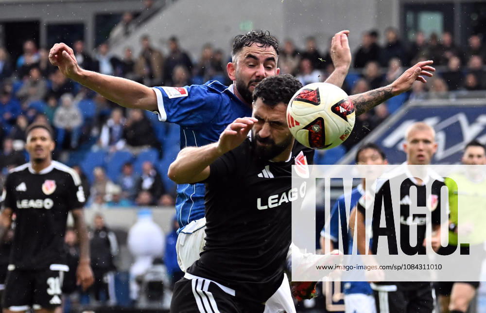Soccer 2. Bundesliga, SV Darmstadt 98 vs. Energie Cottbus, Tolgay Cigerci (Energie Cottbus), Marco Richter (SV Darmstadt 98). DFL and DFB regulations prohibit any use of photographs as image sequences and or quasi-video. Darmstadt