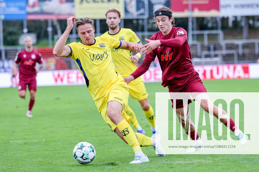 Soccer, SC Fortuna Köln vs. 1 FC Saarbrücken, 3. Liga, Südstation, Matchday 8, 2026–2027 Season: Bennit Bröger (Fortuna Cologne, No. 38) in a tackle against Philip Fahrner (1. FC Saarbrücken, No. 42). DFB regulations prohibit any use of photographs as image sequences and or quasi-video. North Rhine-Westphalia, Germany