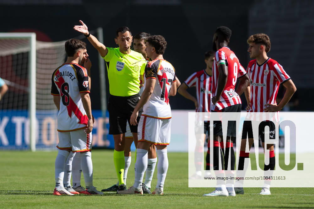 ESP LaLiga EA Sports Rayo Vallecano vs. Athletic Club: Referee Jose Maria Sanchez Martinez speaks with players from Rayo Vallecano and Athletic Club; the match was suspended after Rayo Vallecano fans threw paper airplanes onto the field in protest against their president and due to a lack of cleaning services during the LaLiga EA Sports match between Rayo Vallecano and Athletic Club played at Vallecas Stadium in Madrid on October 10, 2026 in Spain. Spain Soccer